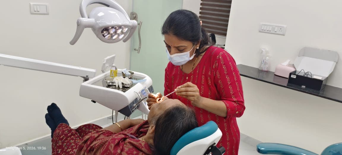 Dr. Shruthi A M providing dental treatment